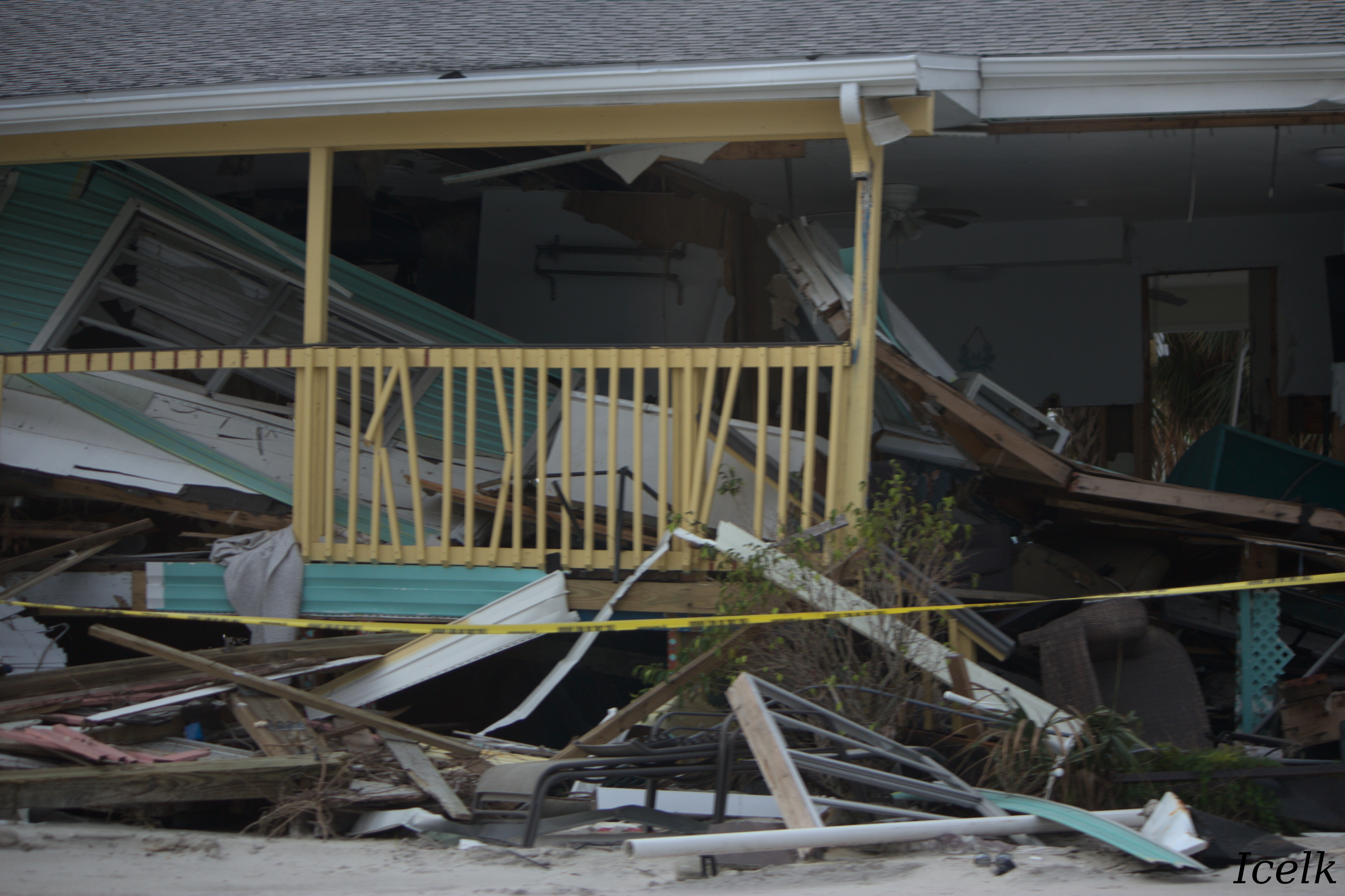 ruined house with a collapsed veranda