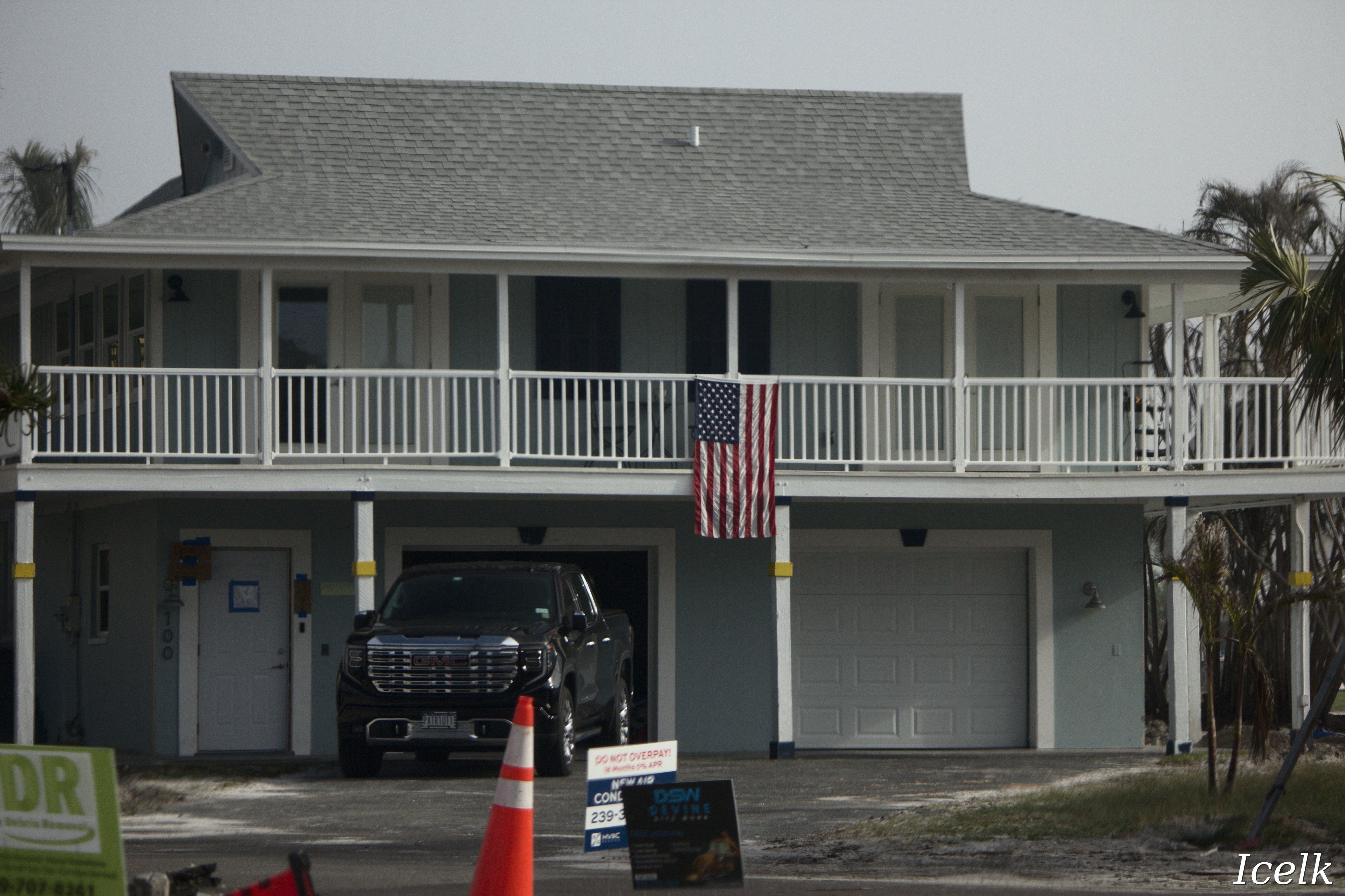 unscated house with an American flag